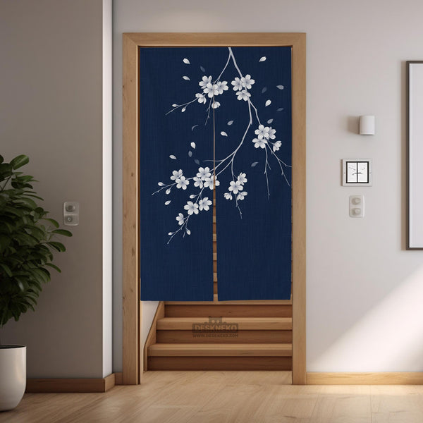 Navy door curtain with pink cherry blossom branches and a light floral layout on a dark background.