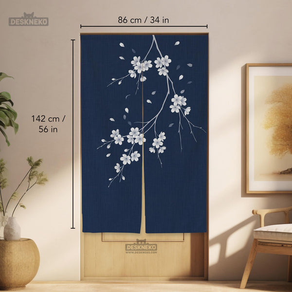 Navy door curtain with pink cherry blossom branches and a light floral layout on a dark background.