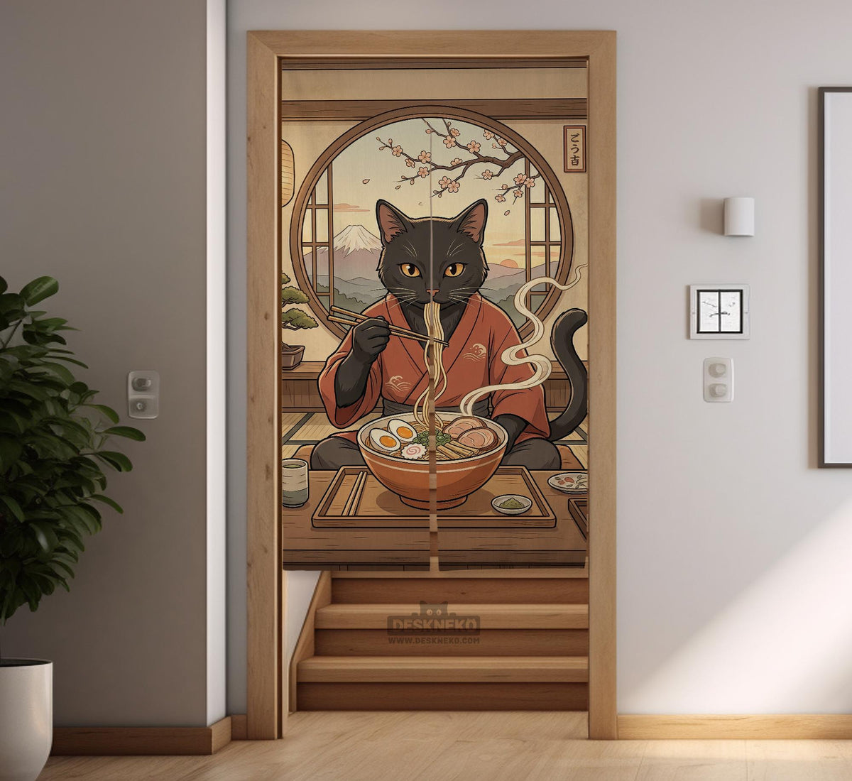 A decorative door curtain with a black cat design, cherry blossoms, and warm neutral background tones.