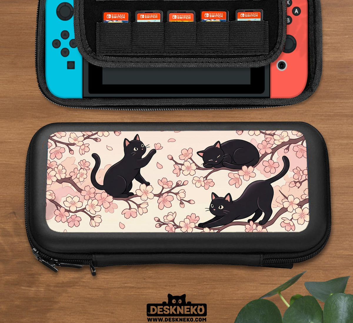 Switch case with black cats and cherry blossoms on a light pastel background.