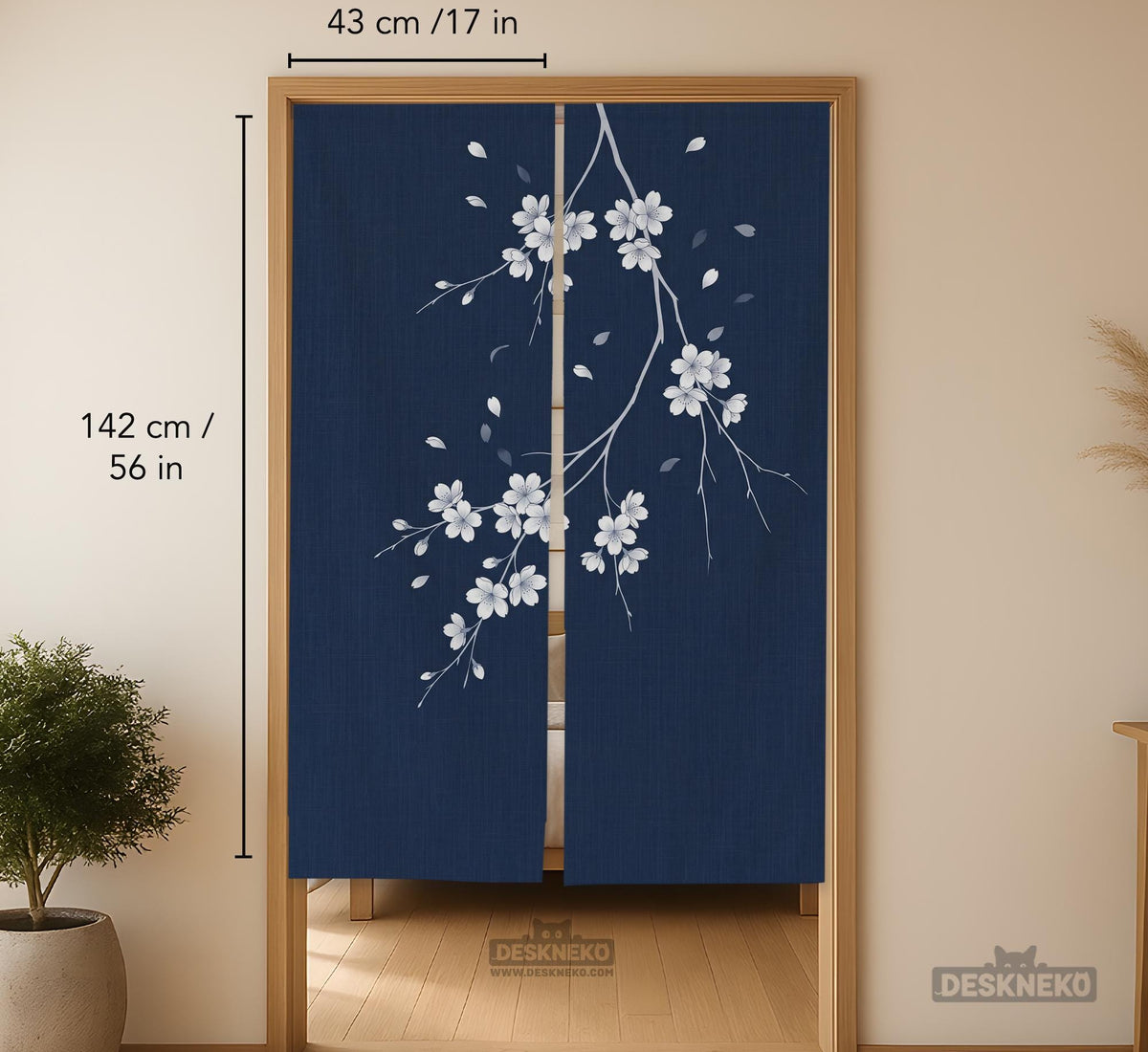 Navy door curtain with pink cherry blossom branches and a light floral layout on a dark background.