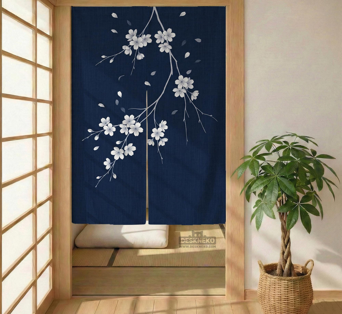 Navy door curtain with pink cherry blossom branches and a light floral layout on a dark background.