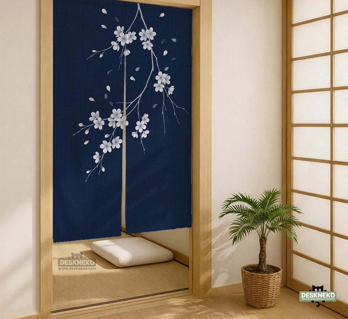 Navy door curtain with pink cherry blossom branches and a light floral layout on a dark background.