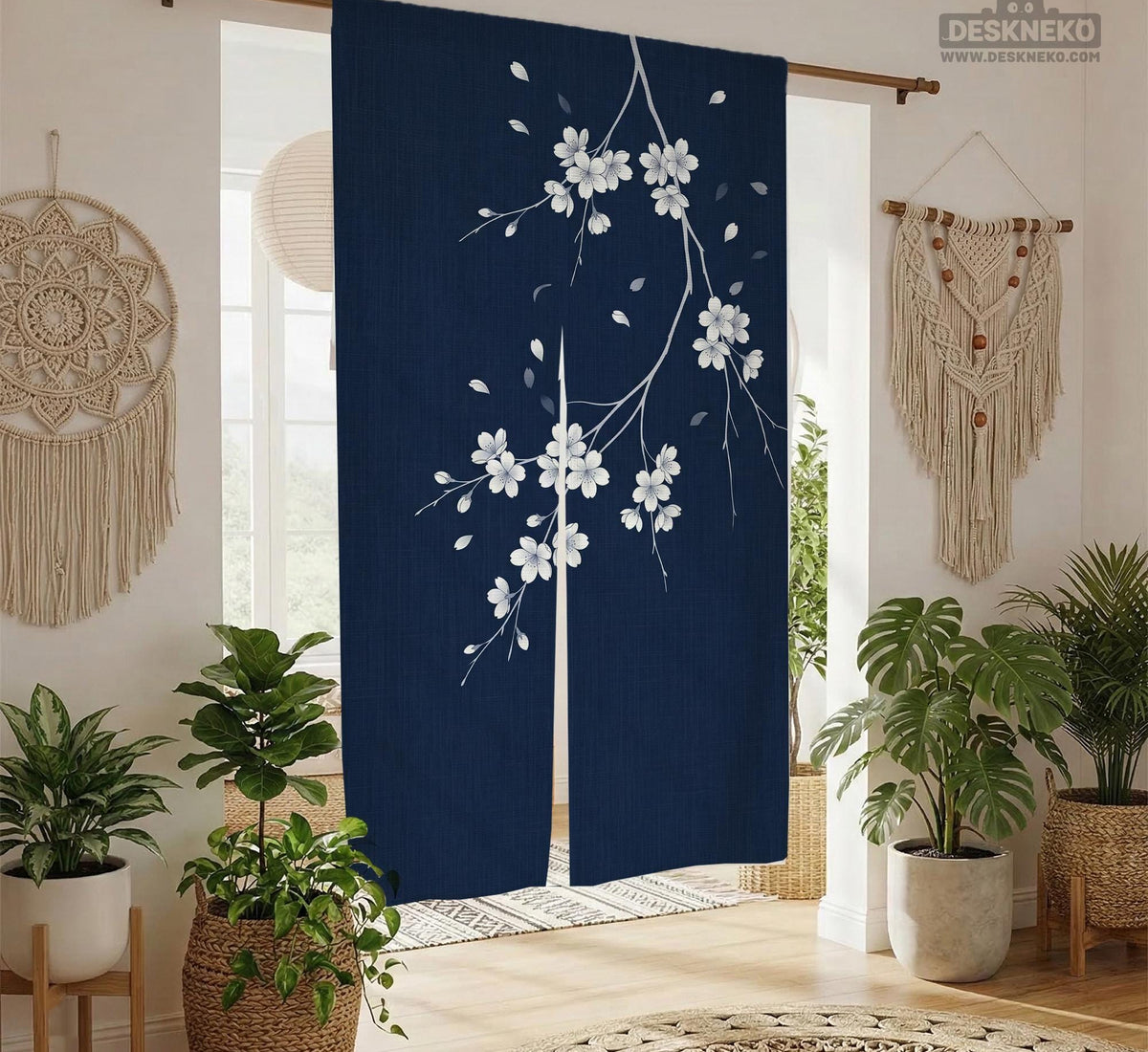 Navy door curtain with pink cherry blossom branches and a light floral layout on a dark background.