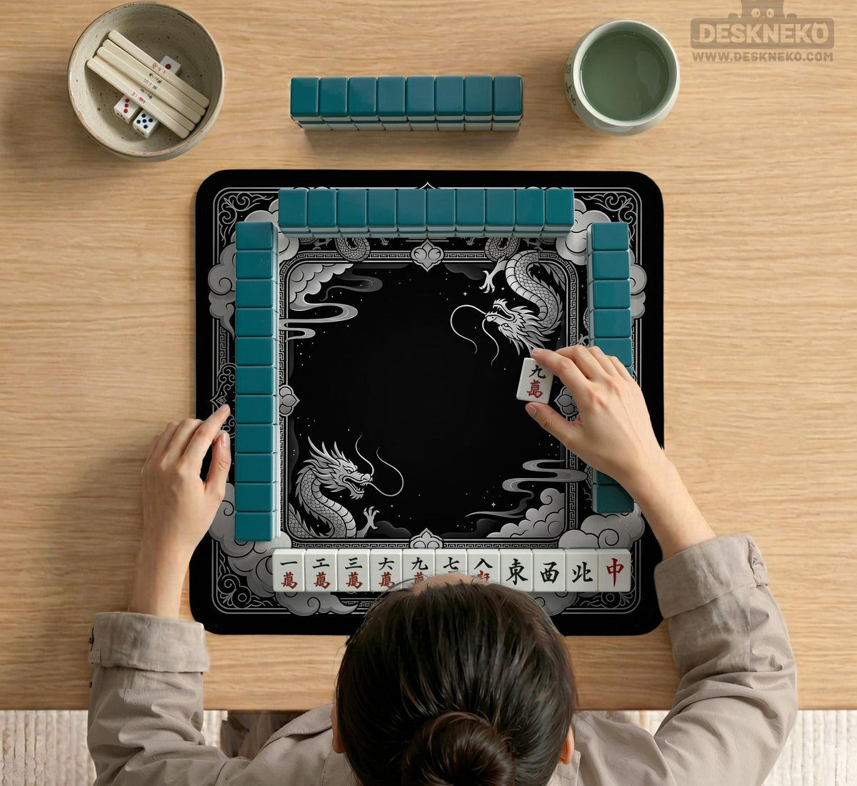 Square mahjong table mat with a black and silver dragon border, cloud details, and a scalloped edge.