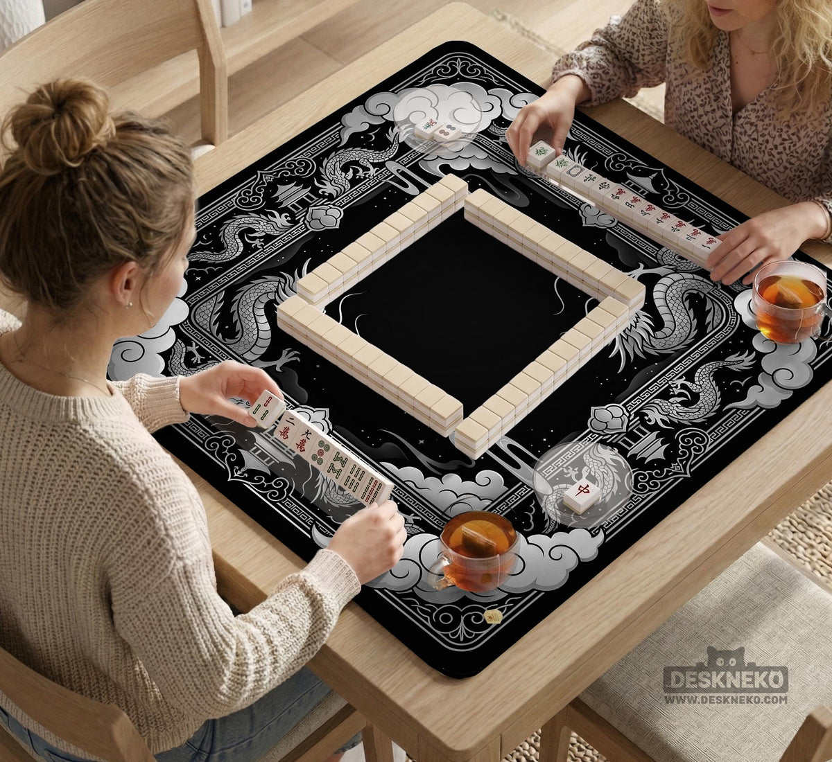 Square mahjong table mat with a black and silver dragon border, cloud details, and a scalloped edge.