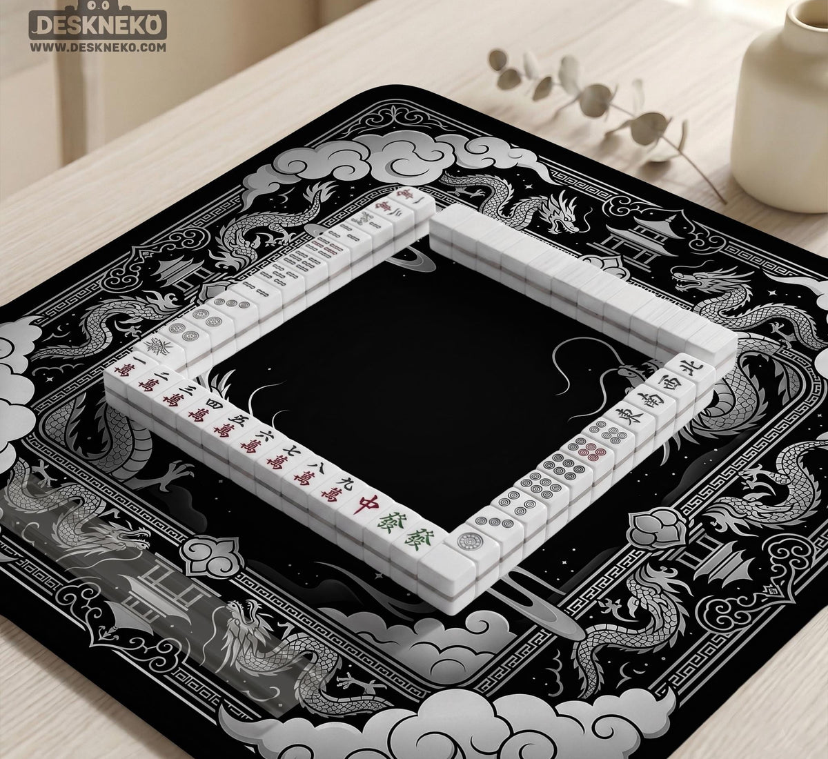 Square mahjong table mat with a black and silver dragon border, cloud details, and a scalloped edge.