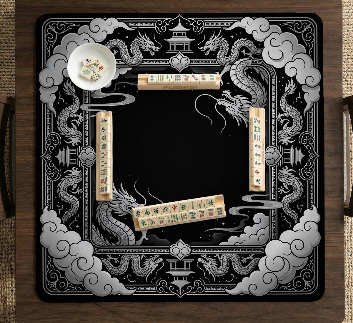 Square mahjong table mat with a black and silver dragon border, cloud details, and a scalloped edge.