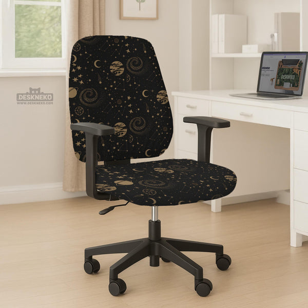Black chair cover with a dark galaxy pattern, muted gold stars and celestial artwork on a chair.