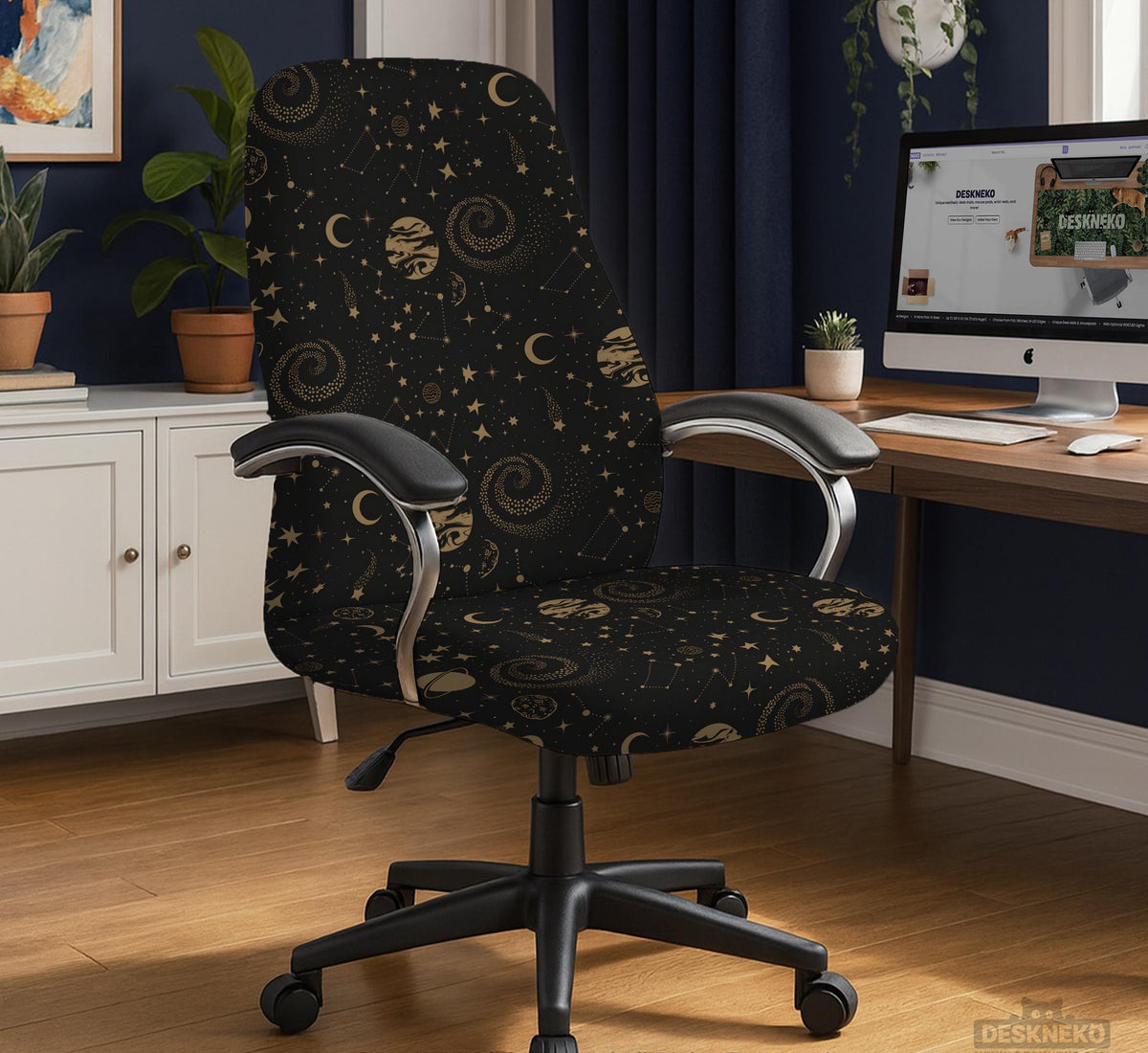 Black chair cover with a dark galaxy pattern, muted gold stars and celestial artwork on a chair.