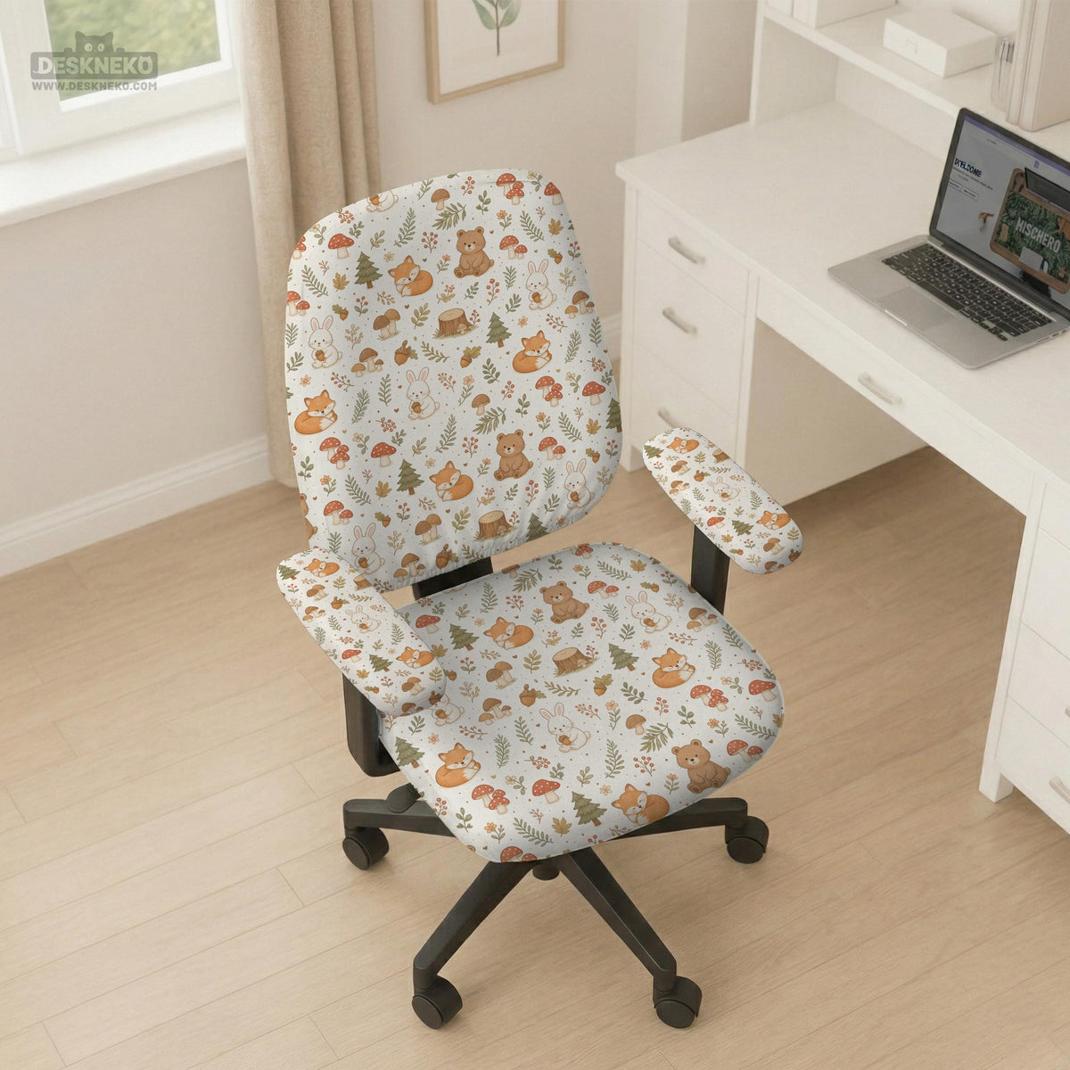 A gaming chair cover with a woodland animal print featuring foxes, rabbits, bears, mushrooms, and leaves in green, brown, and beige tones.