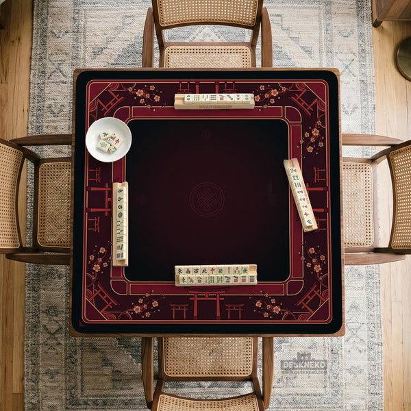 Square burgundy mahjong mat with a cherry blossom floral border and a dark open center.