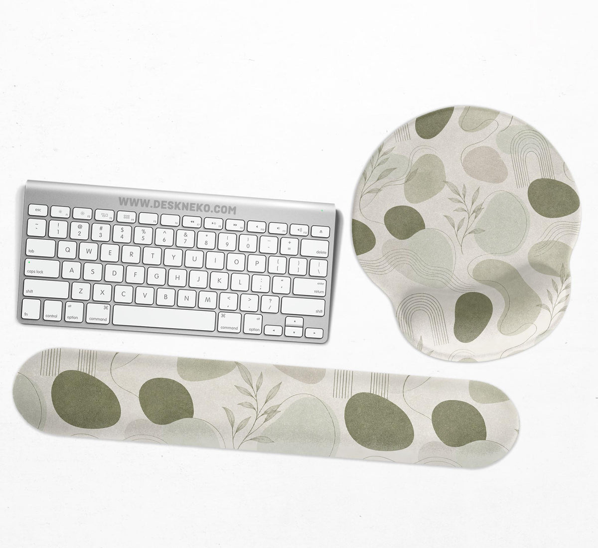 Green abstract botanical mouse pad with a rounded organic pattern and matching keyboard wrist rest option.