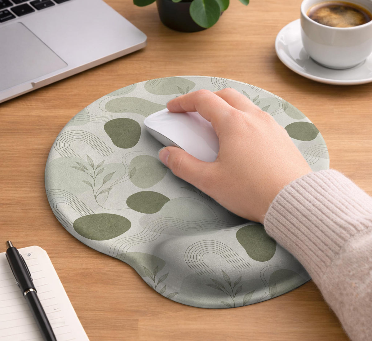 Green abstract botanical mouse pad with a rounded organic pattern and matching keyboard wrist rest option.