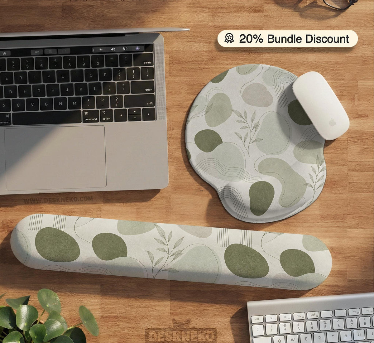 Green abstract botanical mouse pad with a rounded organic pattern and matching keyboard wrist rest option.
