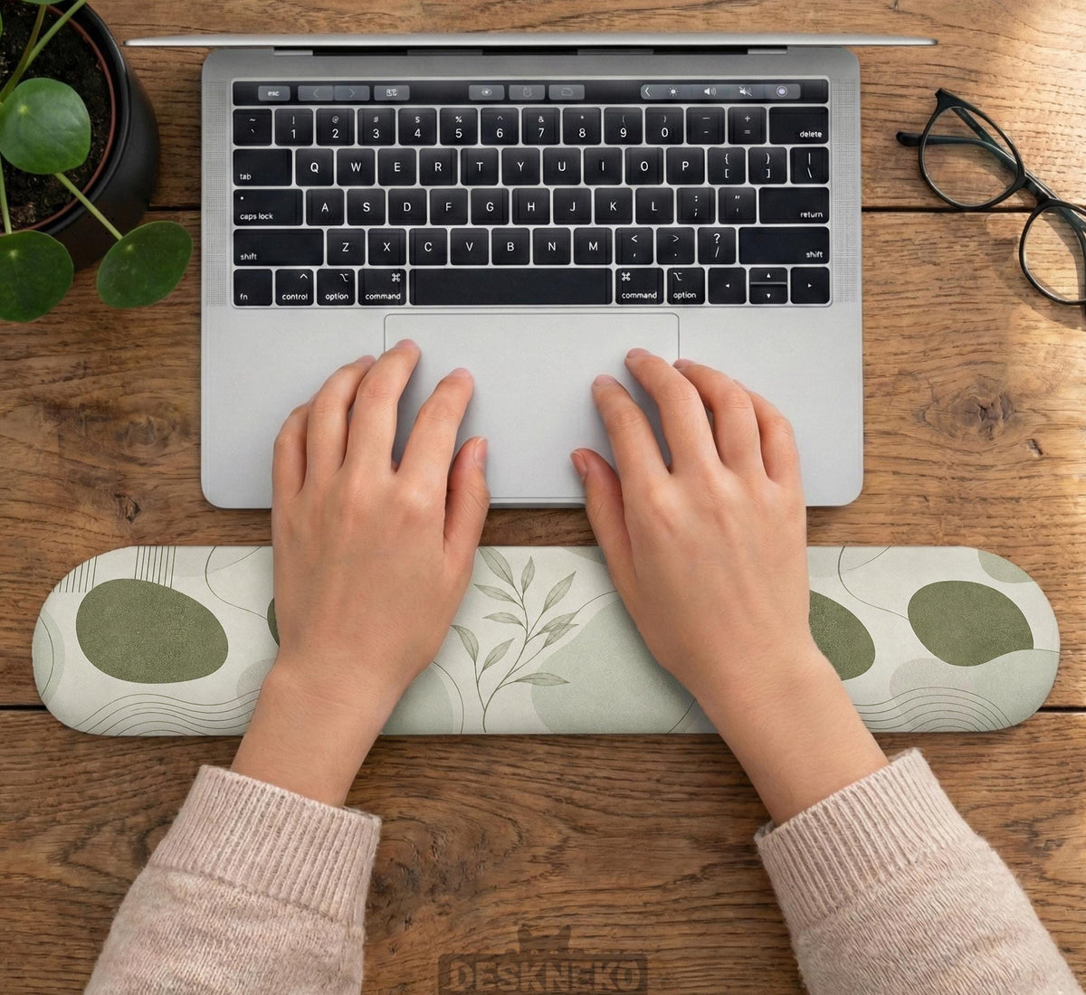 Green abstract botanical mouse pad with a rounded organic pattern and matching keyboard wrist rest option.