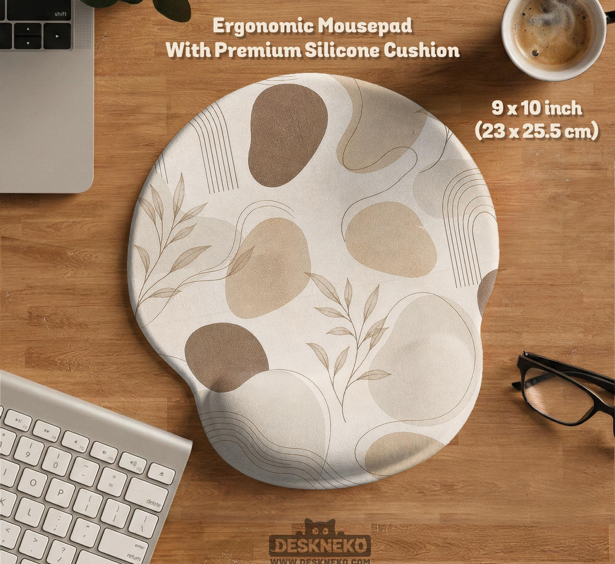 Beige desk mat with fine botanical line drawings and soft abstract shapes on a light neutral background.