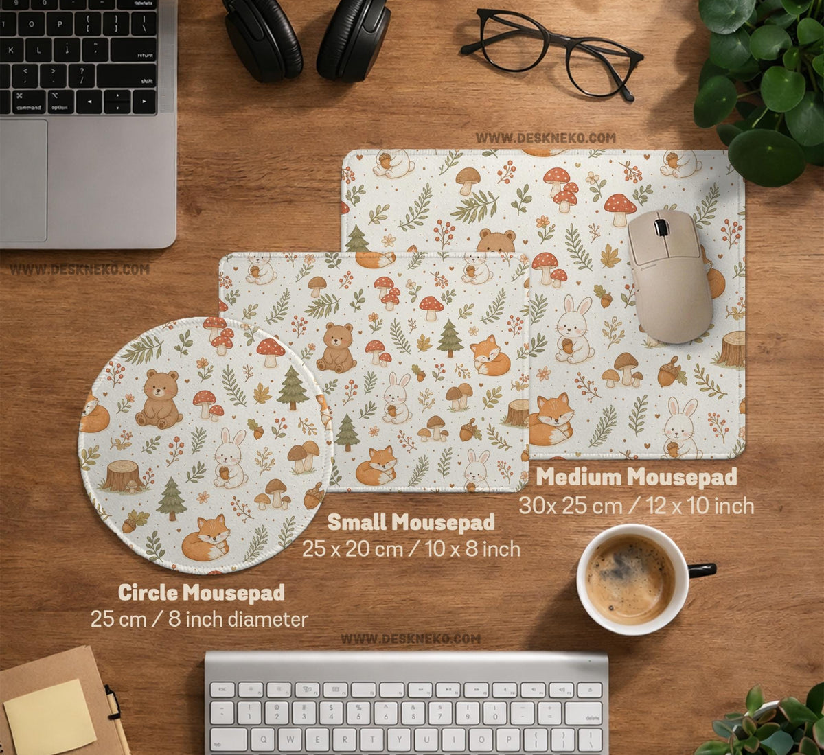 Cream desk mat with a woodland animal pattern featuring foxes, bunnies, mushrooms, berries, acorns, and sage leaves in soft green tones.