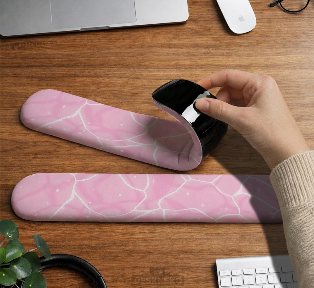 Soft pink mouse pad and wrist rest with a cloud-marble pattern, pale linework, and small star details.