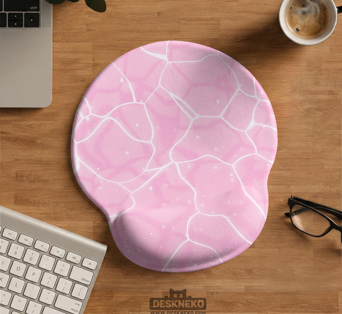 Soft pink mouse pad and wrist rest with a cloud-marble pattern, pale linework, and small star details.