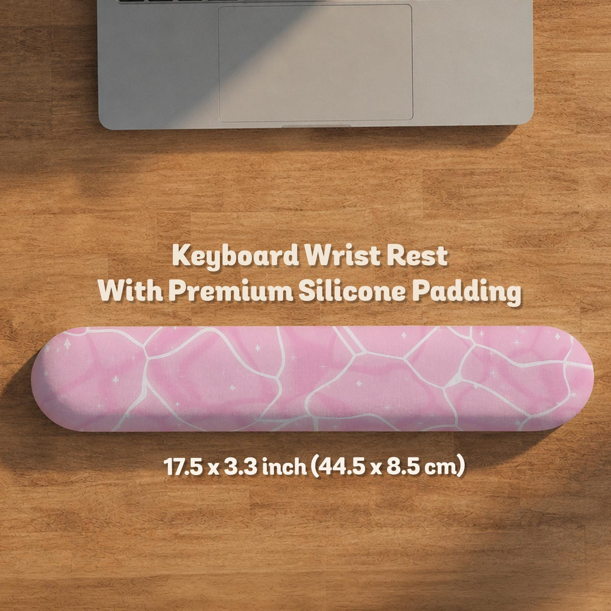 Soft pink mouse pad and wrist rest with a cloud-marble pattern, pale linework, and small star details.