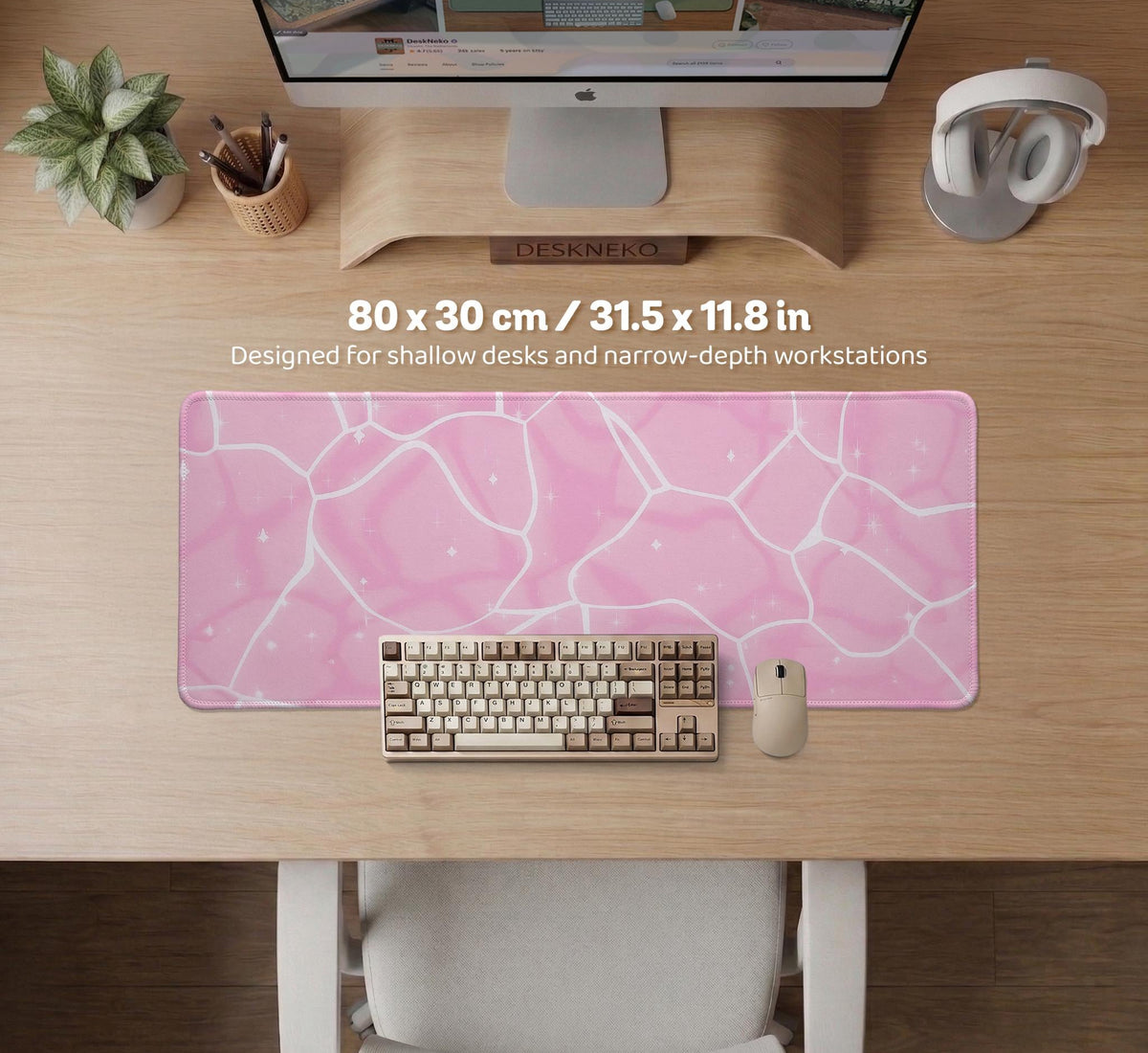Soft pink desk mat with a kawaii cloud-marble pattern, white crackle lines, and small star accents.