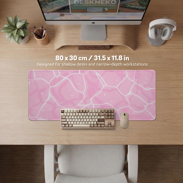 Soft pink desk mat with a kawaii cloud-marble pattern, white crackle lines, and small star accents.