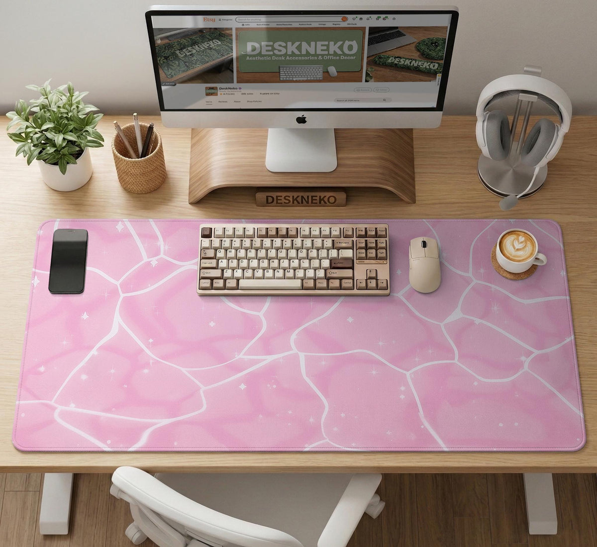 Soft pink desk mat with a kawaii cloud-marble pattern, white crackle lines, and small star accents.