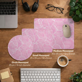 Soft pink desk mat with a kawaii cloud-marble pattern, white crackle lines, and small star accents.