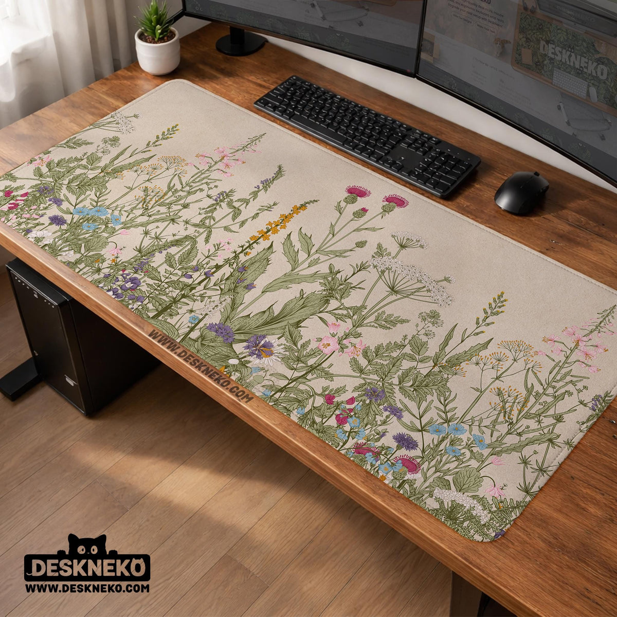 A desk mat with a botanical meadow design featuring wildflowers, leafy stems, and soft neutral colors.