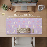 Lavender desk mat with an all-over pattern of bunny faces, clouds, moons, bows, and flowers in pastel colors.