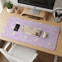 Pastel lavender desk mat with an all-over pattern of bunnies, crescent moons, clouds, bows, stars, and small flowers.