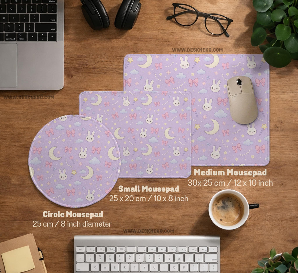 Pastel lavender desk mat with an all-over pattern of bunnies, crescent moons, clouds, bows, stars, and small flowers.
