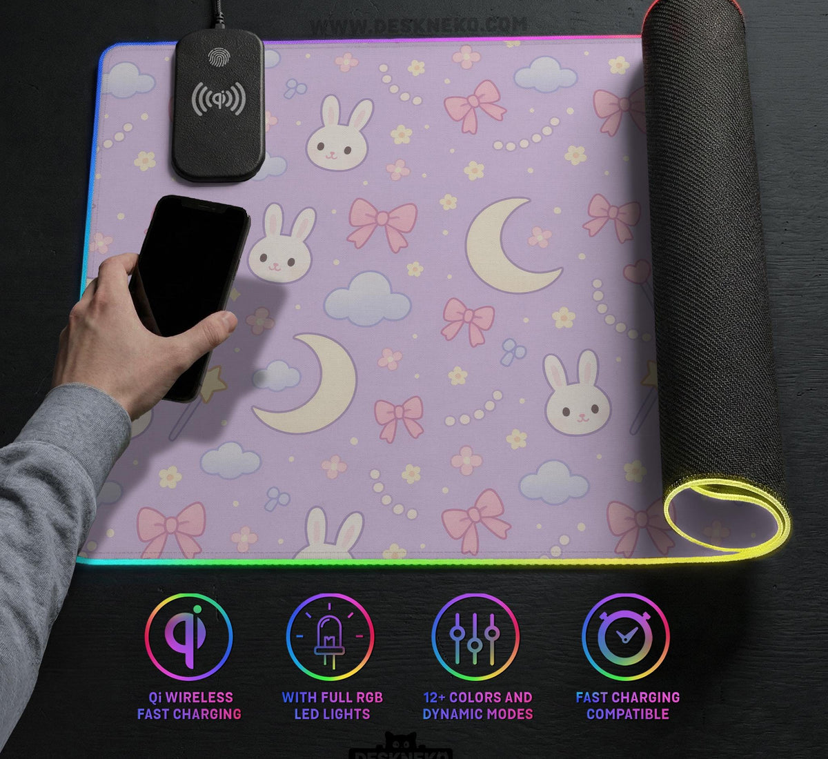 Pastel lavender desk mat with an all-over pattern of bunnies, crescent moons, clouds, bows, stars, and small flowers.