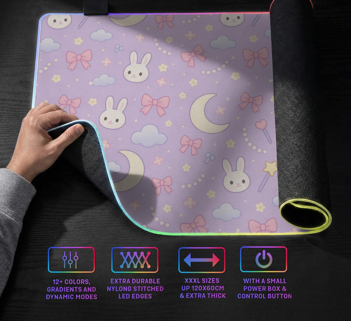 Pastel lavender desk mat with an all-over pattern of bunnies, crescent moons, clouds, bows, stars, and small flowers.