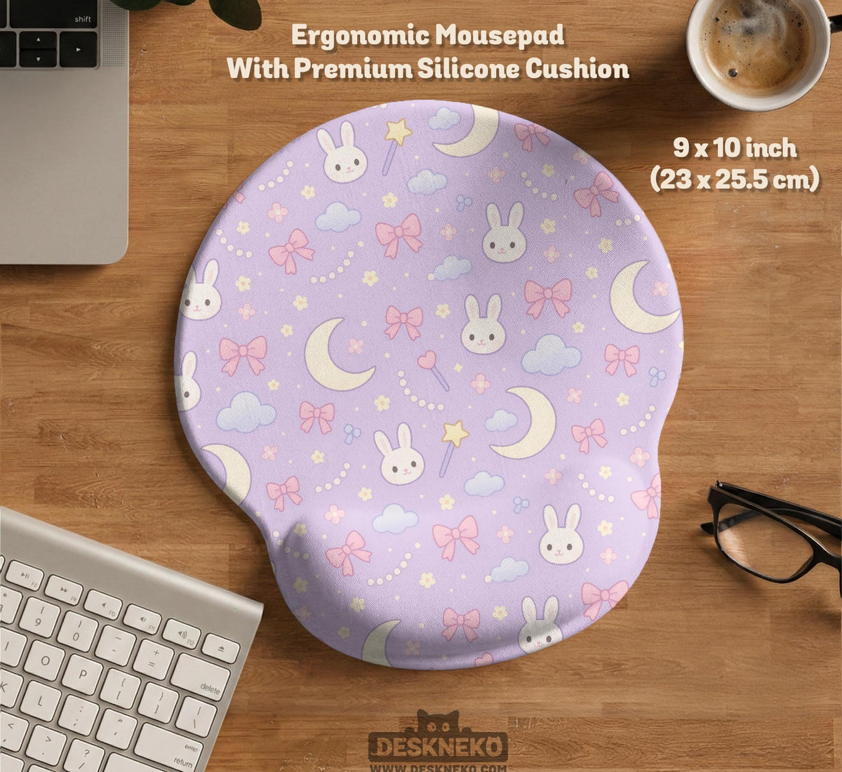 Pastel lavender desk mat with an all-over pattern of bunnies, crescent moons, clouds, bows, stars, and small flowers.