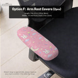 Pink chair cover with bunny faces, crescent moons, clouds, and bows on a white chair.
