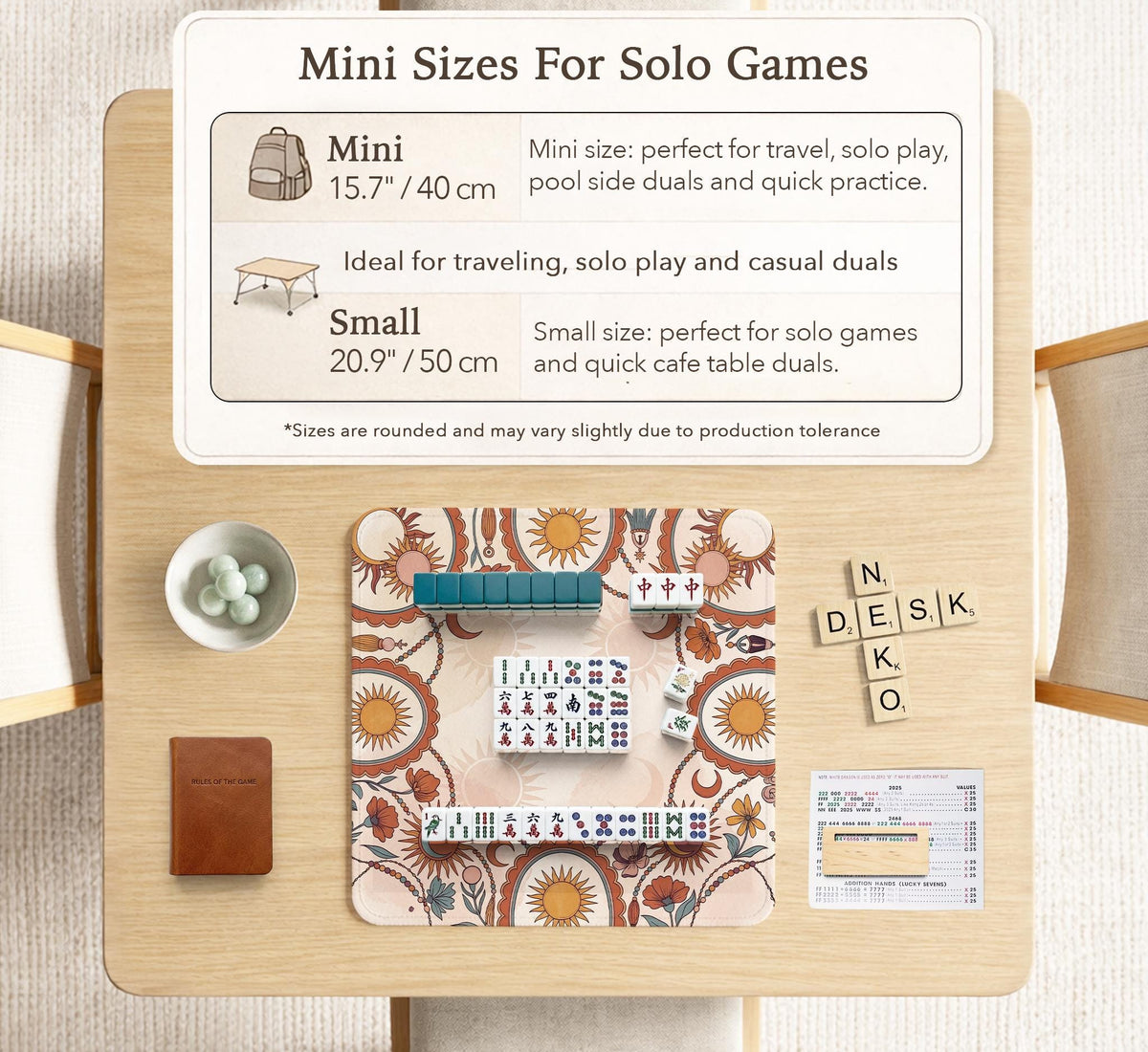 A square mahjong mat with a scalloped edge, sun and moon artwork, terracotta flowers, a soft cream background, and a decorative border around the play area.