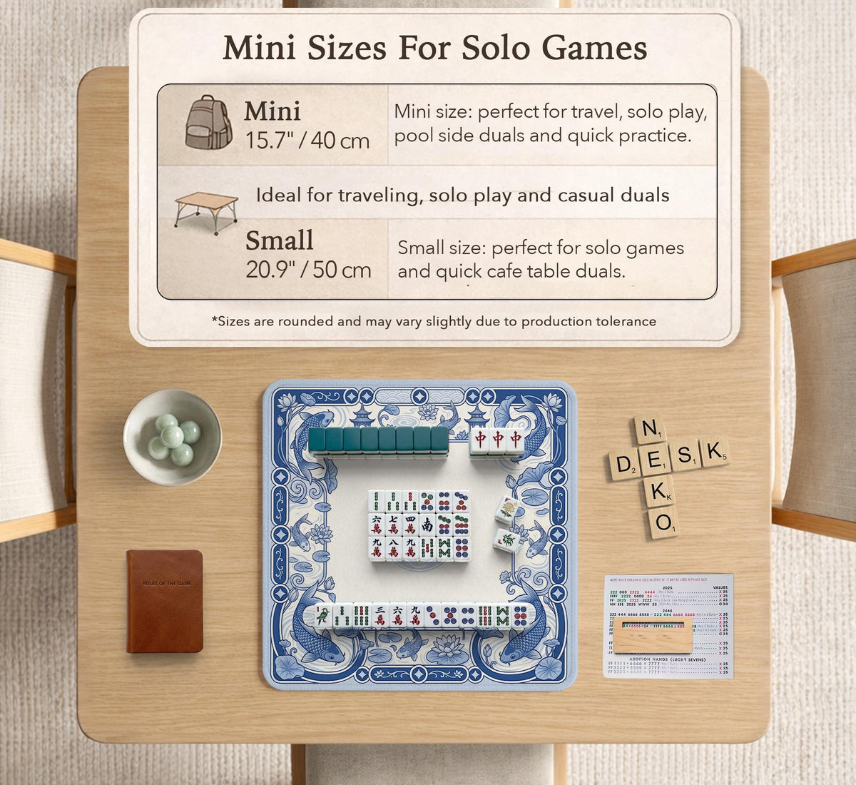 Navy blue square mahjong table mat with lotus flowers and koi fish in a porcelain-style border and a plain center.