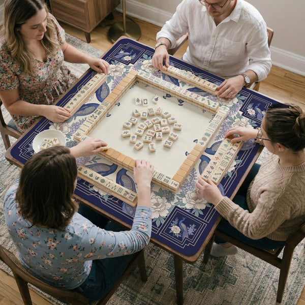 Blue mahjong mat with a floral peacock border and an open center area for tile play.