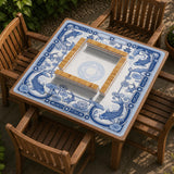 Navy blue square mahjong table mat with lotus flowers and koi fish in a porcelain-style border and a plain center.