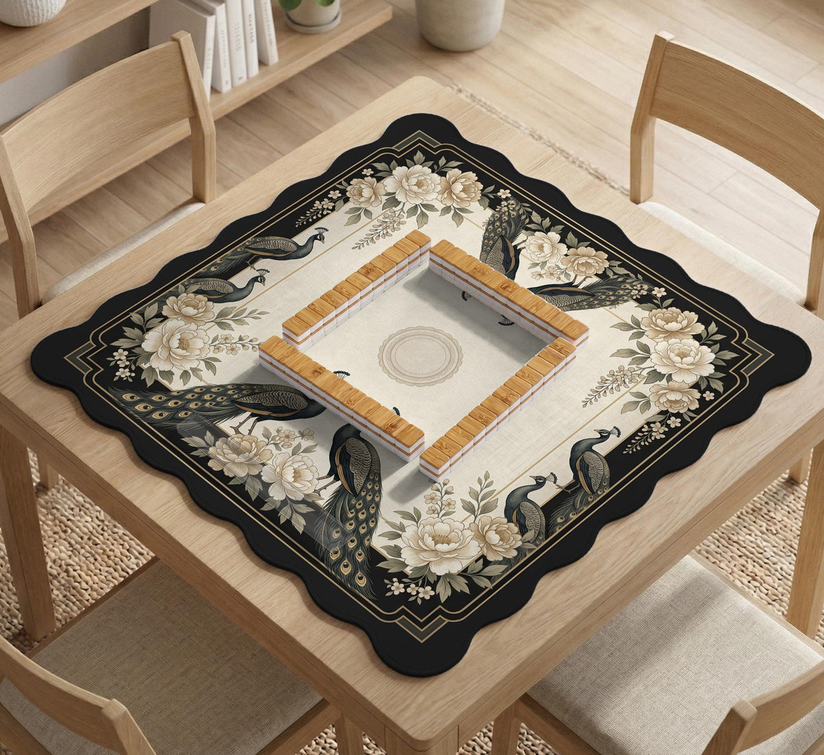Square ivory mahjong mat with a black peacock border, cream flowers, and gold accent details.