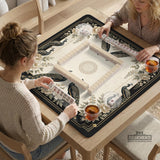 Cream mahjong table mat with a chinoiserie floral border, dark peacocks, soft gold linework, and an open center area.