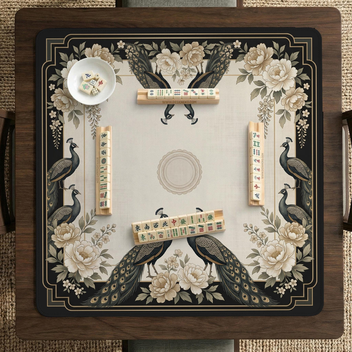 Cream mahjong table mat with a chinoiserie floral border, dark peacocks, soft gold linework, and an open center area.