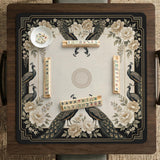 Cream mahjong table mat with a chinoiserie floral border, dark peacocks, soft gold linework, and an open center area.