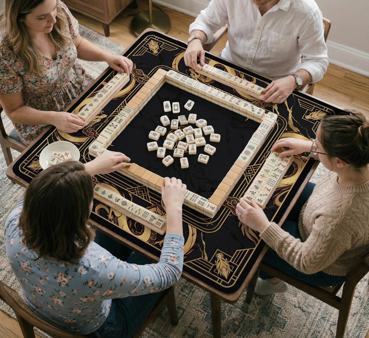 Black mahjong table mat with a gold dragon border, gold geometric corner details, and a clear center play area.