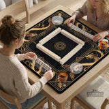 Square black mahjong mat with gold dragon artwork around the border and a light marble texture in the center.