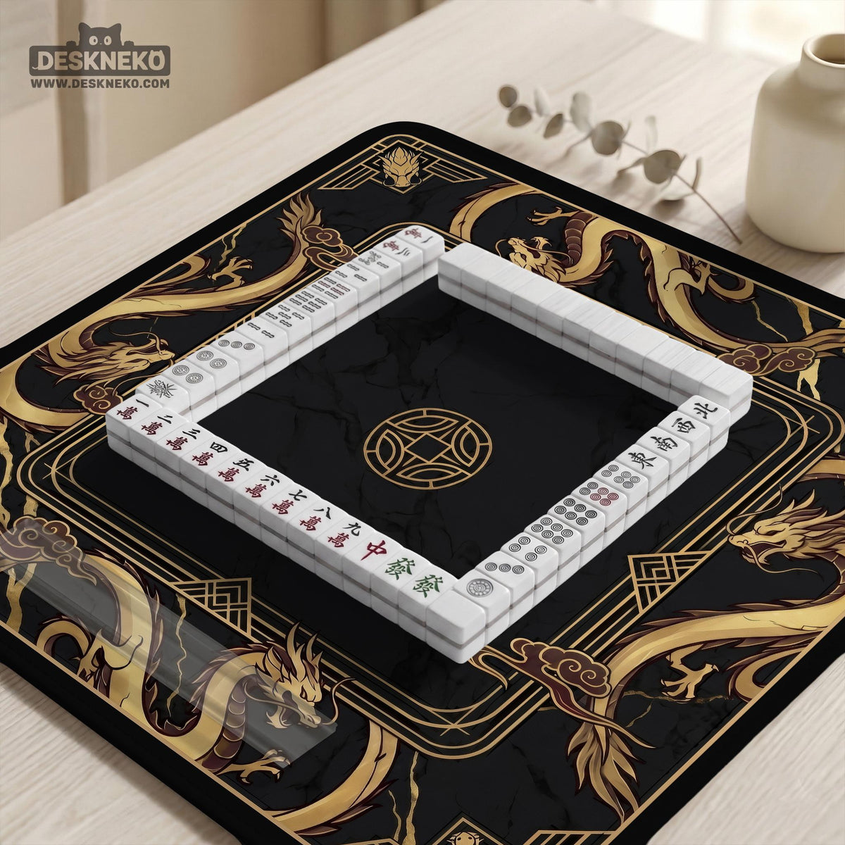 Black mahjong table mat with a gold dragon border, gold geometric corner details, and a clear center play area.