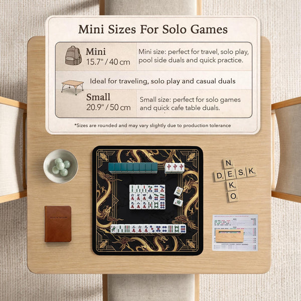 Square black mahjong mat with gold dragon artwork around the border and a light marble texture in the center.