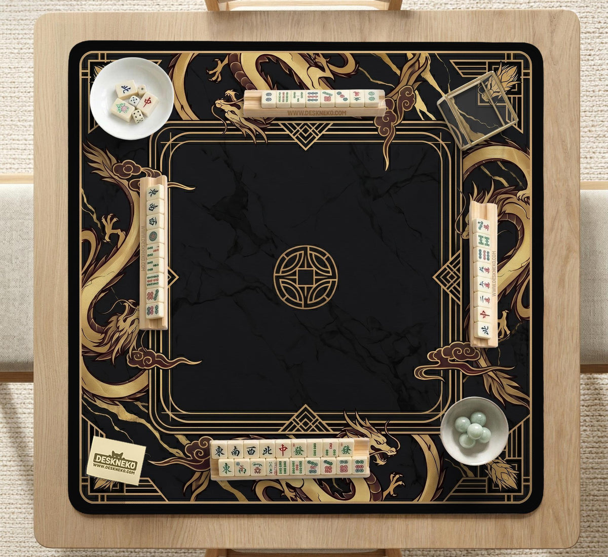Black mahjong table mat with a gold dragon border, gold geometric corner details, and a clear center play area.